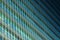 Modern futuristic glass building abstract background. Exterior of office glass building architecture. Facade of sustainable