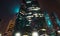 Modern futuristic skyscrapers buildings in business center in Moscow city at night with illuminated windows and lights