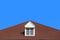 modern gable roof design house wall with clear blue sky background.