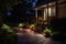 Modern gardening landscaping design details. Illuminated pathway in front of residential house. Landscape garden with