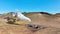 Modern geothermal energy power plant working, Factory working with smoke, Located in a picturesque volcanic landscape in