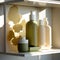 Modern glass shelf with bottles with beauty products