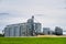 Modern granary elevator. Metal silos for grain storage, drying, cleaning agricultural products, flour, cereals and grain. Agro-