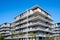 Modern gray apartment buildings with all-round balconies