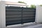 Modern gray high design gate aluminum portal outdoor door front of suburb house