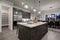 Modern gray kitchen features dark gray cabinetry