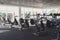 Modern gym interior with equipment, fitness exercise bikes