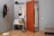 Modern hallway with shoe rack and wooden coat stand