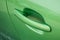 modern handle of green car