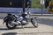 A modern Harley Davidson motor bike with highly polished chrome parts parked on a cobbled street in Albuderia in Portugal