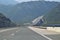 Modern highway through mountainous area