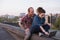 Modern hipster youth couple on roof