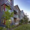 Modern home with balcony and lawn in Daybreak UT