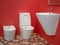Modern home bathroom interior design with white washbasin, toilet, bidet and vivid red walls