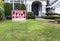 Modern Home for Sale with sign in front yard