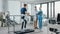 Modern Hospital Physical Therapy: Patient with Injury Walks on Treadmill Wearing Advanced Robotic