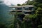 A modern house on a cliff, surrounded by lush greenery, overlooks a misty mountainous landscape