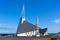 Modern Iceland Church on bright blue sky background