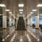 Modern indoor space with shiny corridor, stairs, seating area, square lights, marble floor