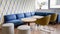 Modern interior with blue sofas and round tables in the business center