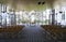 Modern interior with chairs and glass windows of Bishop Selwyn Chapel at Holy Trinity Cathedral, Parnell, Auckland, New Zealand