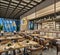 Modern interior design of restaurant lounge, oriental arabic style with wire mesh ceiling and hidden lights,  wood and bronze gold