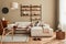 Modern interior of living room with design modular beige sofa, coffee table,  furniture, pendant lamp, shelf, slippers, carpet.