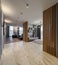 Modern interior of luxury private house. Grey tones. Wooden design