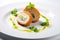 modern interpretation of Chicken Kiev: A contemporary plating of deconstructed Chicken Kiev, with separate components displayed in