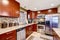 Modern kitchen interior with mosaic back splash trim and granite