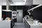 Modern kitchen interior with smart appliances in black color coordination