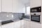 Modern kitchen with white cupboards