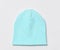 Modern knitted light blue beanie hat, knitwear isolated on white