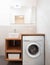 Modern laundry room with washing machine, small bathroom laundry at home