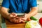 Modern lifestyle concept. Closeup of man using smartphone                                                to search for how to cook