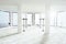 Modern light loft empty office with windows in floor in white co