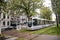 Modern light rail city tram passing through the city of Rotterdam