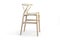 Modern light wood stool with wicker seat. 3d render