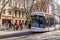 Modern lightrail tram carrying passengers in the streets of Marseille city, France