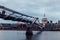 Modern London skyline on River Thames on cloudy gray day