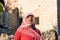 Modern Lookalike Muslim Woman With Scarf and Sunglasses Posing in Front of the Mosque