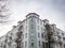 Modern Low Rise Apartment Building with Cloudy Sky