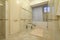 Modern luxury beige and golden bathroom with toilet