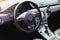 Modern luxury car Interior - steering wheel, shift lever and dashboard. Car interior luxury inside. Steering wheel, dashboard, spe