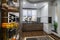 Modern luxury large brown kitchen with dining table and vertical drawer pulled out