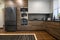 Modern luxury large dark brown, gray and black kitchen details