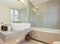 Modern marble tiled bathroom
