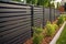 Modern metal fence for fencing the yard area