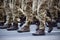 Modern military footwear on soldiers. A soldier in uniform is marching in the parade. People in the crowd. Boots on the