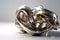 Modern Minimalist Waves in Silver and Aged Bronze: 3D Rendered Industrial Desig